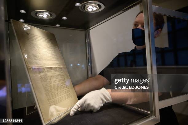 Page of the first printing of the United States Constitution is displayed at the offices of Sotheby's auction house in New York on September 17,...