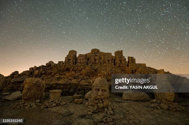 This photograph shows massive stone head statues at the archaeological site of Mount Nemrut in Adiyaman, southeastern Turkey, on September 17, 2021....