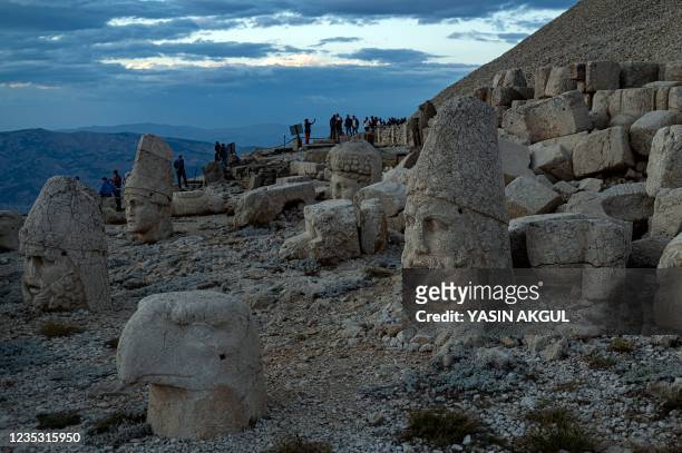This photograph shows massive stone head statues at the archaeological site of Mount Nemrut in Adiyaman, southeastern Turkey, on September 16, 2021....
