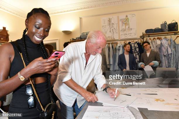 Eunice Olumide and Paul Costello attend the Paul Costello presentation during London Fashion Week September 2021 on September 17, 2021 in London,...