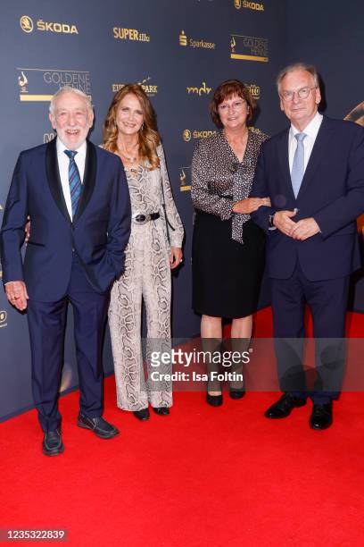 Actor Dieter Hallervorden, Christiane Zander, Gabriele Haseloff and German politician Reiner Haseloff attend the Goldene Henne Award 2021 at...