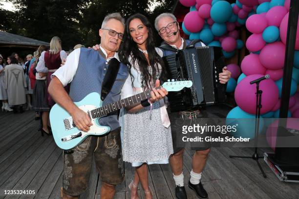 Lilly Becker dance to the music of Herbert Groeschel and Alfred Freddy Fischer during the "Wiesn Wiesn Charity Night at "Käfer Alm" on September 17,...