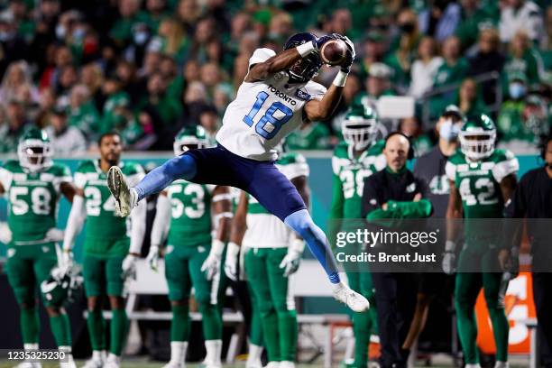 Dejon Brissett of the Toronto Argonauts makes a leaping catch in the first half of the game between the Toronto Argonauts and Saskatchewan...