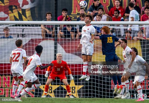 University of Maryland defender Brett St. Martin heads clear during a Big 10 college soccer match between the Maryland Terrapins and the Michigan...