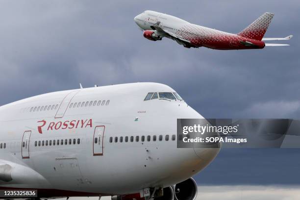 Rossiya Airlines Boeing 747-400 widebody jet airliners at Moscow-Sheremetyevo International Airport.