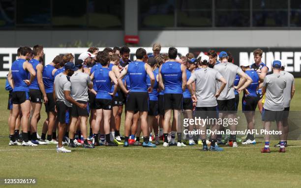 Players and staff huddle during the Western Bulldogs training session at Mineral Resources Park on September 18, 2021 in Perth, Australia.