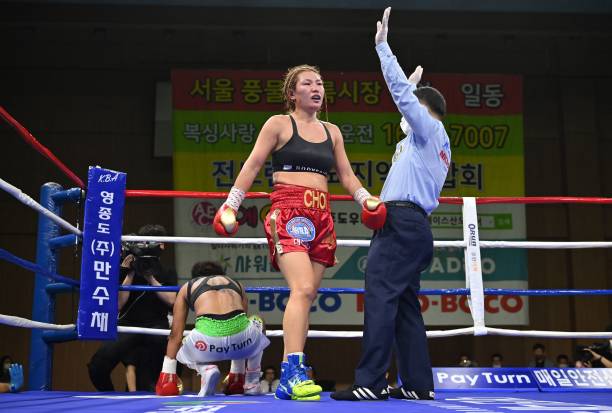 Choi Hyun-mi of South Korea reacts after her victory against Simone Da Silva of Brazil during their WBA super featherweight title boxing bout in...
