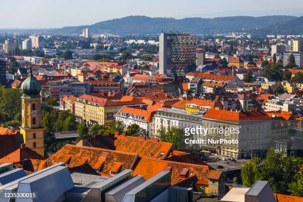 View on a part of the urban skyline of the historic Old Town pictured from the Schlossberg in Graz, Austria on September 11, 2021.