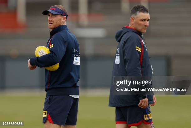 Simon Goodwin, Senior Coach of the Demons and Adem Yze, Midfield Coach of the Demons look on during the Melbourne Demons training session at Lathlain...