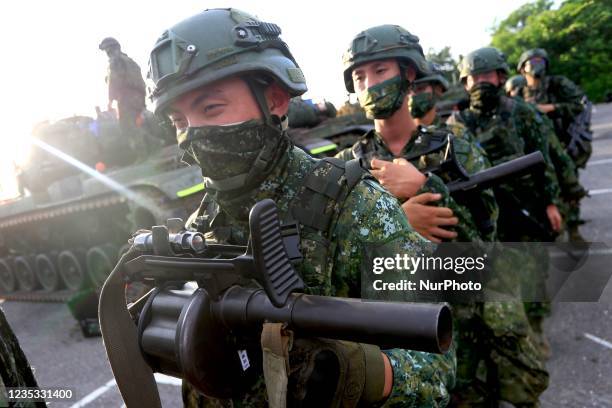 Taiwanese soldiers prepare grenade launchers, machine guns and tanks for the Han Kuang drill for simulation in the event of Chinas invasion, in...