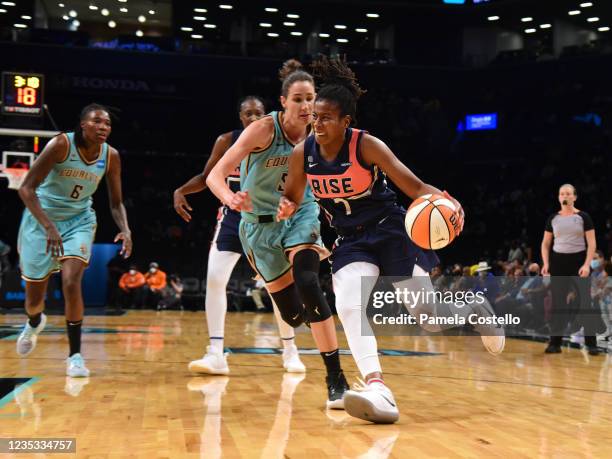 Ariel Atkins of the Washington Mystics drives to the basket against the New York Liberty on August 12, 2021 at Barclays Center in Brooklyn, New York....