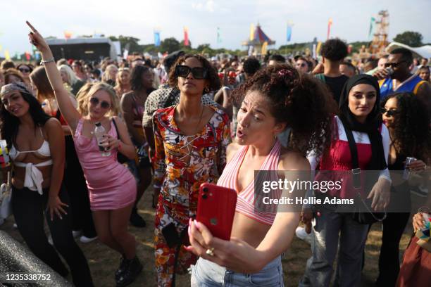 People dance at the Strawberries & Creem Festival 2021 at Childerley Orchard on September 18, 2021 in Cambridge, England. The festival has partnered...