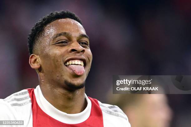 Ajax's Dutch defencer Jurrien Timber celebrates after scoring a goal during the Dutch Eredivisie match between Ajax Amsterdam and SC Cambuur at the...