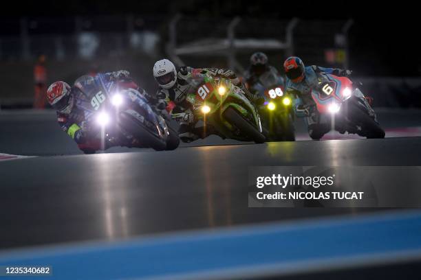 Pilots compete at dawn in the 84th Bol d'Or 24-hour motorbike endurance race, at the Paul-Ricard racetrack in Le Castellet, southern France on...