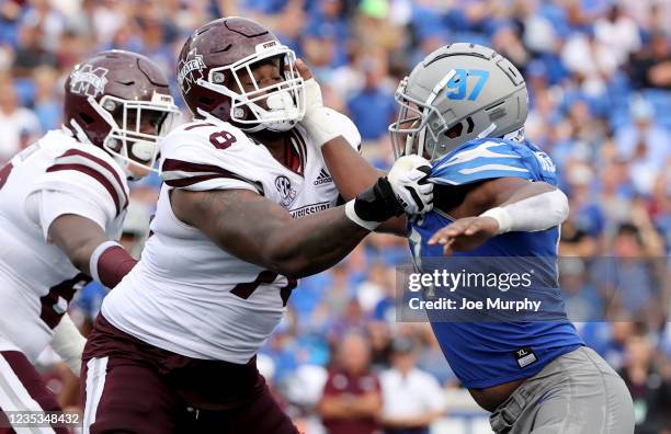 Scott Lashley of the Mississippi State Bulldogs blocks against Wardalis Ducksworth of the Memphis Tigers on September 18, 2021 at Liberty Bowl...