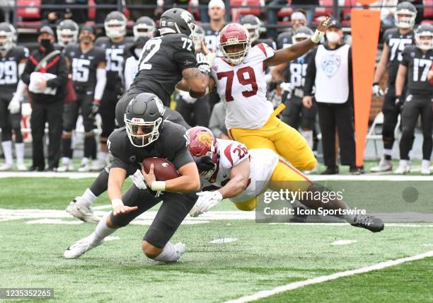 Linebacker Kana'i Mauga sacks Washington State quarterback Victor Gabalis during the game between theWashington State Cougars and the USC Trojans on...