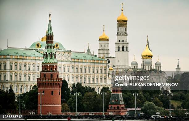 View of the Kremlin taken during the last day of the three-day parliamentary and local elections in Moscow on September 19, 2021. - The vote will see...