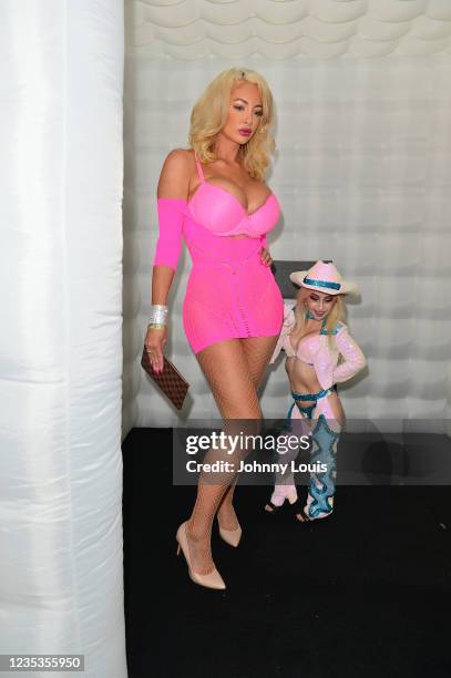 Adult film actress Nicolette Shea and Tiny Texie attend the EXXXOTICA Expo 2021 at Miami Airport Convention Center on September 17, 2021 in Miami,...