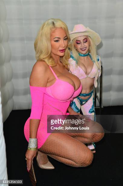 Adult film actress Nicolette Shea and Tiny Texie attend the EXXXOTICA Expo 2021 at Miami Airport Convention Center on September 17, 2021 in Miami,...