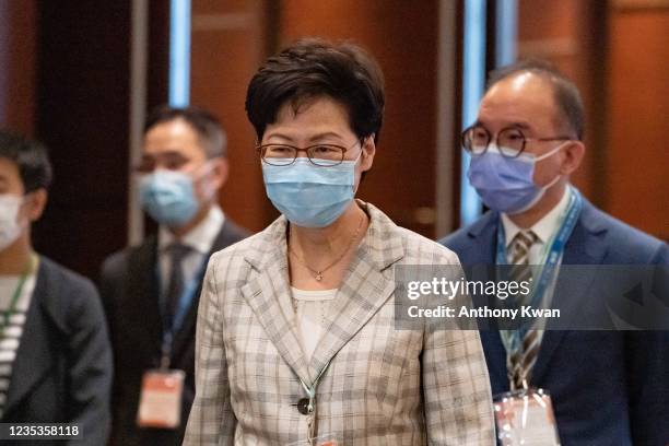 Hong Kong Chief Executive Carrie Lam meets reporters after visiting the polling station at the Convention Centre during the 2021 Election Committee...