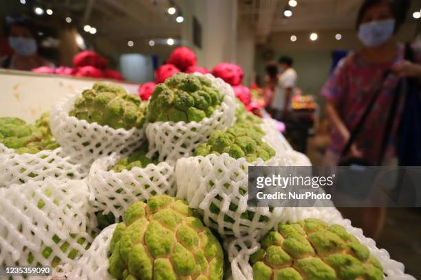 Sugar-apples are displayed at a fruit shop following Chinas ban on imports of both Taiwanese sugar apples and wax apples. Taiwan foreign minister...