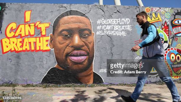 May 30: Street art commemorating George Floyd, killed in police custody in Minneapolis after footage emerged of him pleading for air as a police...