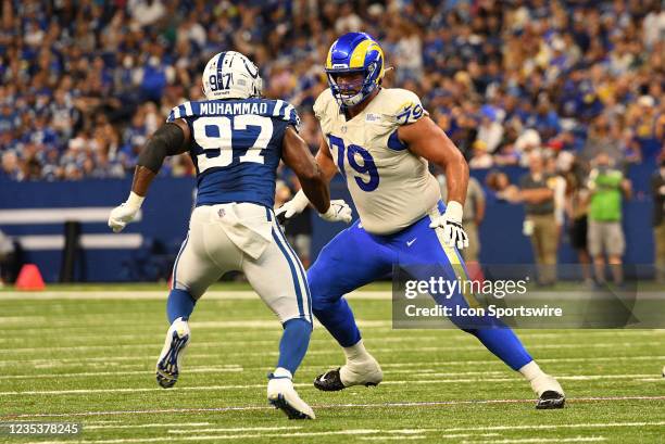 Los Angeles Rams Offensive Tackle Rob Havenstein blocks Indianapolis Colts Defensive End Al-Quadin Muhammad during the NFL football game between the...