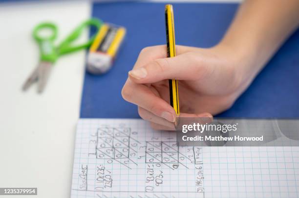 Close-up of a childs hand during a maths lesson at Llanishen High School on September 20, 2021 in Cardiff, Wales. All children aged 12 to 15 across...