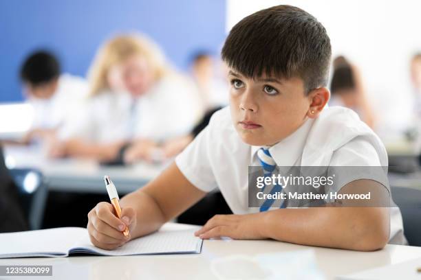 Child looks on during a geography lesson at Llanishen High School on September 20, 2021 in Cardiff, Wales. All children aged 12 to 15 across the UK...