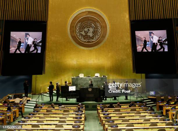 Members of the South Korean boy band BTS watch a music video on the GA Hall monitors at the SDG Moment event as part of the UN General Assembly 76th...