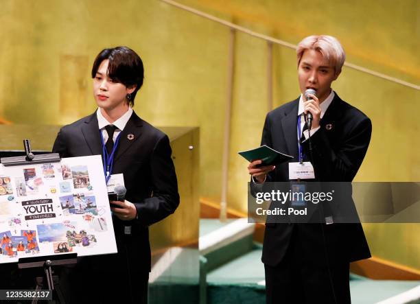 Jimin listens as JHope of the South Korean boy band BTS speaks at the SDG Moment event as part of the UN General Assembly 76th session General Debate...