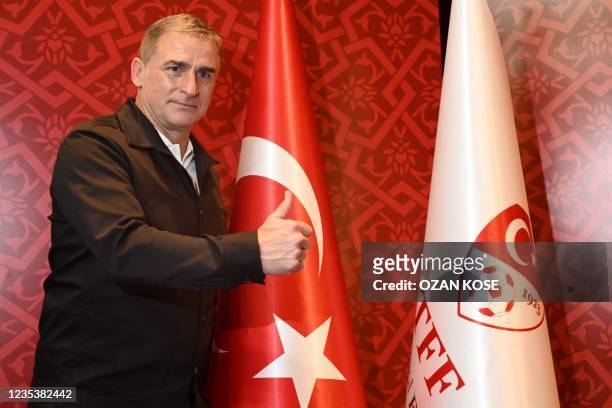 Turkey national football team's newly appointed, German head coach Stefan Kuntz poses during a signing ceremony at Turkish Football Federation Riva...
