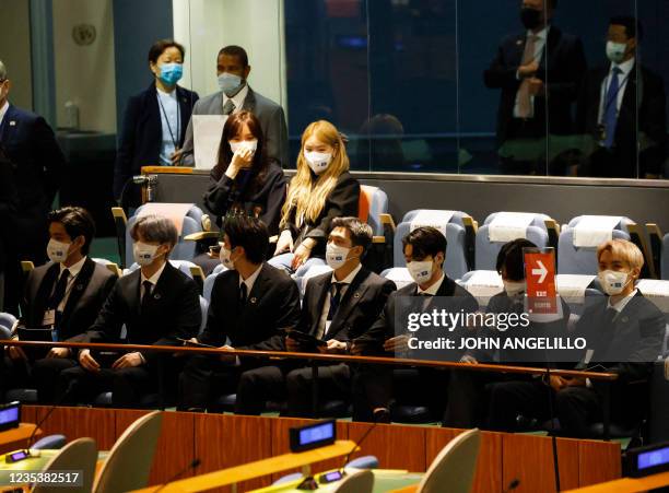 Members of the South Korean boy band BTS wear face masks before they take turns speaking at the SDG Moment event as part of the UN General Assembly...