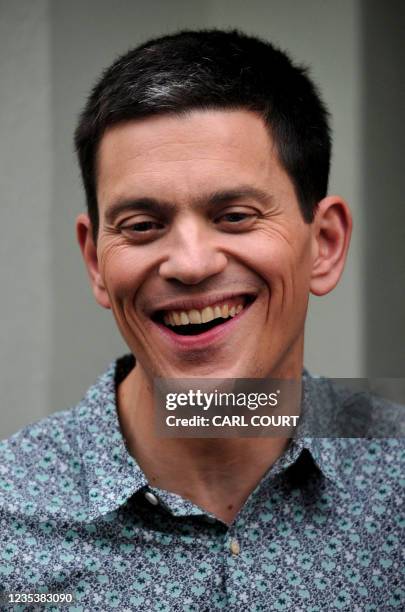 Britain's opposition Labour Party's former Foreign Secretary, and defeated candidate for the party's Leadership, David Miliband, poses for...