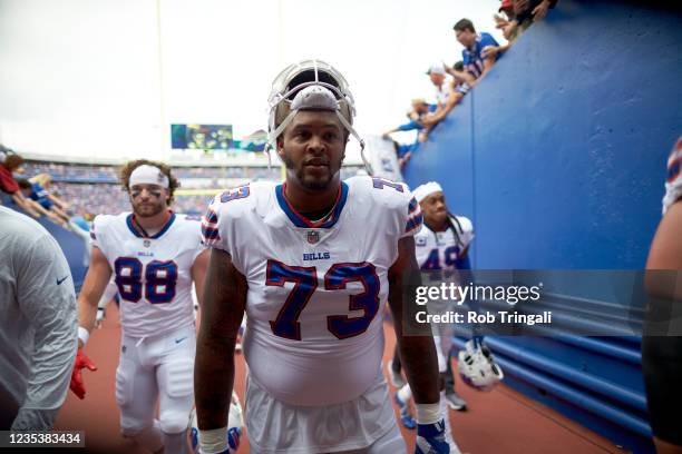 Buffalo Bills Dion Dawkins walking off field after game vs Pittsburgh Steelers at Highmark Stadium. Buffalo, NY 9/12/2021 CREDIT: Rob Tringali