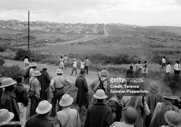 South African police waiting near the township of Sharpeville during demonstrations against government pass laws during a day of protest at...