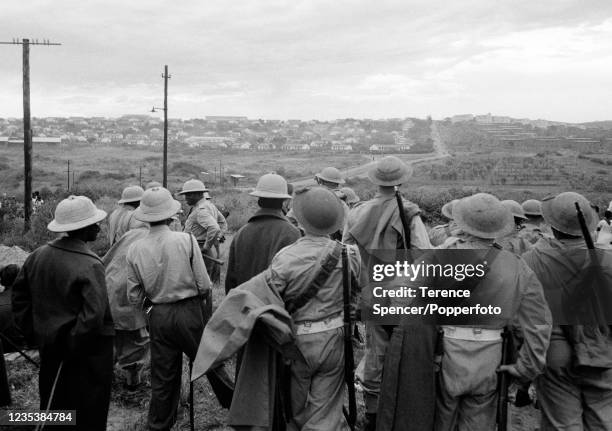 South African police waiting near to the township of Sharpeville during demonstrations against government pass laws during a day of protest at...