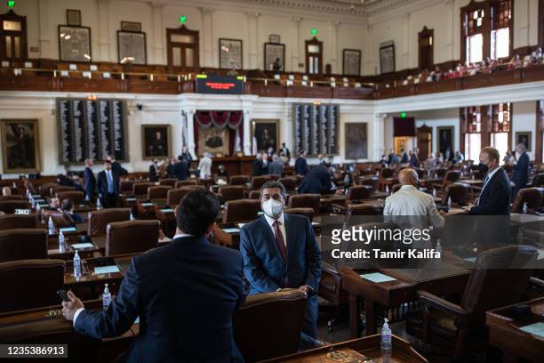 Texas state representatives gather in the House chamber before the start of the 87th Legislature's third special session at the State Capitol on...