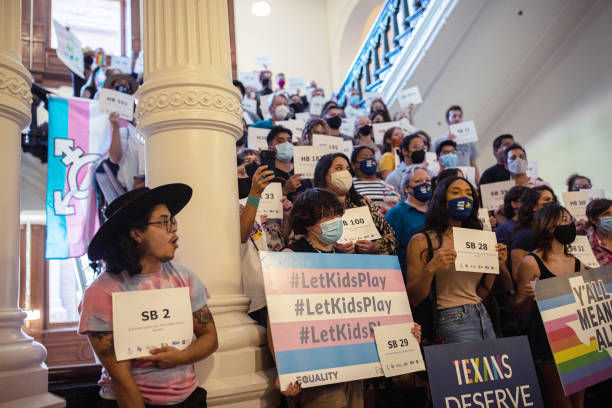 Rights supporters gather at the Texas State Capitol to protest state Republican-led efforts to pass legislation that would restrict the participation...