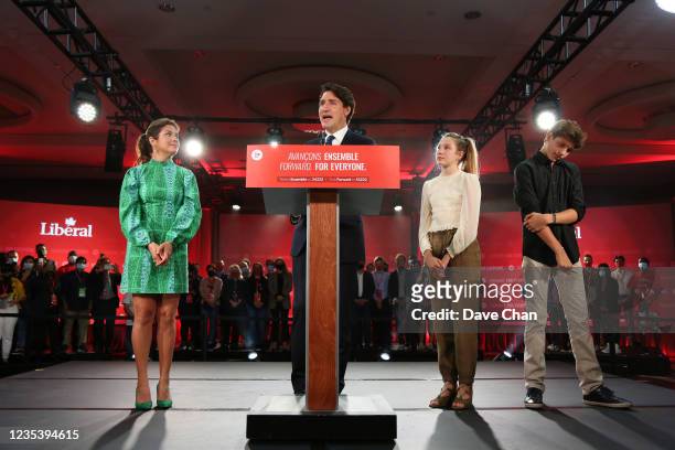 Canada's Prime Minister and Liberal Party Leader Justin Trudeau delivers his victory speech as his wife Sophie Gregoire Trudeau looks on at election...