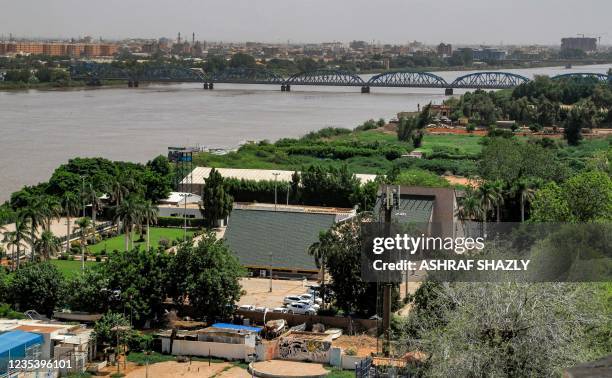 This picture taken on September 21, 2021 shows a view of the Blue Nile steel bridge linking the centre of Sudan's capital Khartoum with the adjacent...