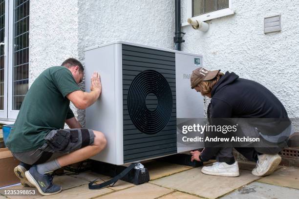 Air source heat pump installers from Solaris Energy installing a Vaillant Arotherm plus 7kw air source heat pump unit into a 1930s built house in...