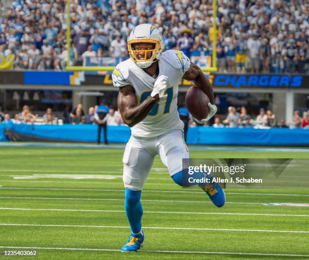 Los Angeles, CA Los Angeles Chargers wide receiver Mike Williams deflects a tackle by Dallas Cowboys Anthony Brown, during his touchdown run at SoFi...