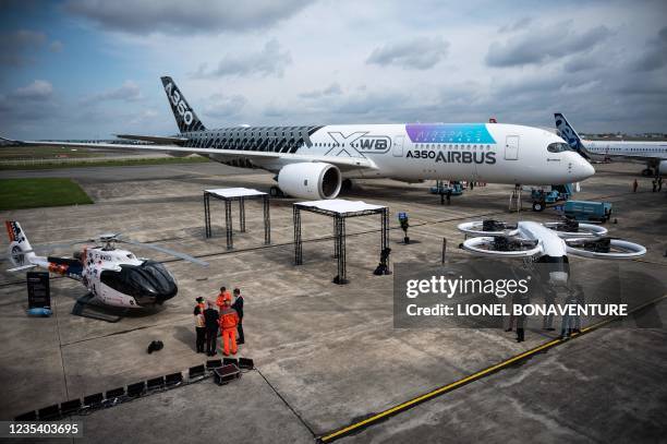 This picture taken on September 21 during an Airbus summit at the Airbus delivery center in Colomiers, near Toulouse, southwestern France, shows an...