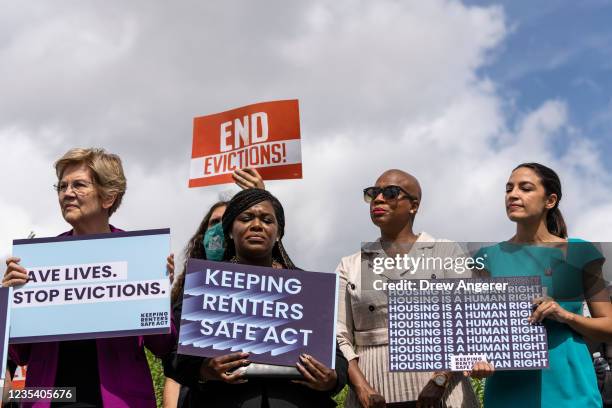 Sen. Elizabeth Warren , Rep. Cori Bush , Rep. Ayanna Pressley and Rep. Alexandria Ocasio-Cortez attend a news conference to introduce legislation...