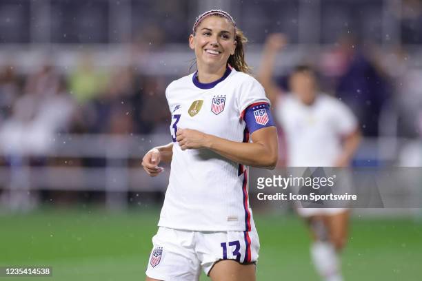 United States forward Alex Morgan celebrates with teammates after scoring a goal during a friendly match between United States and Paraguay on...