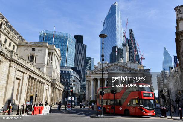 View of Bank of England and City of London skyline on a clear sunny day as seen from Mansion House Street.