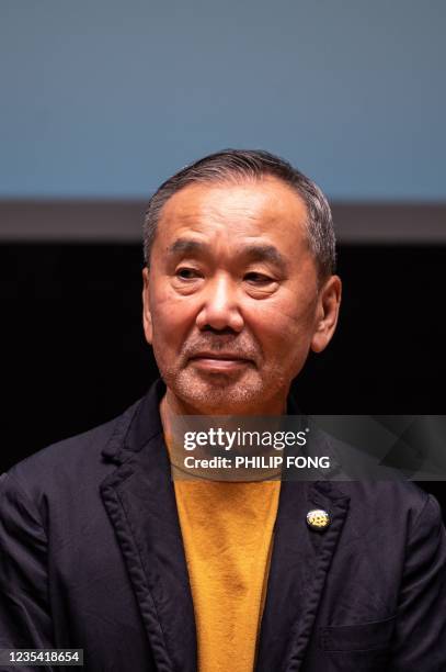 Japanese writer Haruki Murakami attends a press conference during a media preview of The Waseda International House of Literature, also known as...