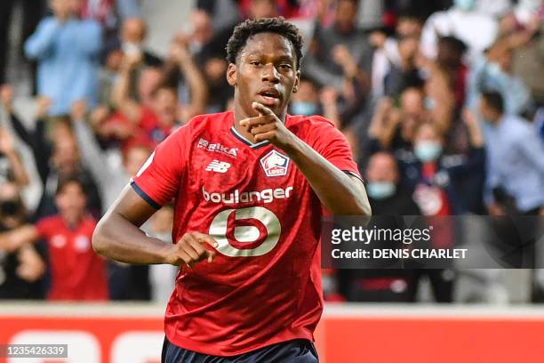 Lille's French forward Jonathan David celebrates after scoring a goal during the French L1 football match between Lille and Reims , at Pierre-Mauroy...