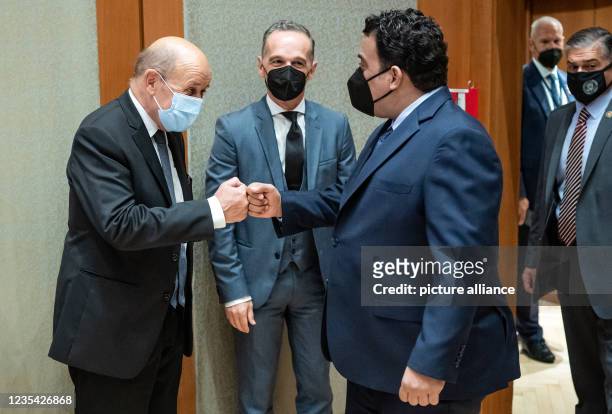September 2021, US, New York: Heiko Maas , Foreign Minister, together with Jean-Yves Le Drian , Foreign Minister of France, welcomes Mohammed Minfi,...
